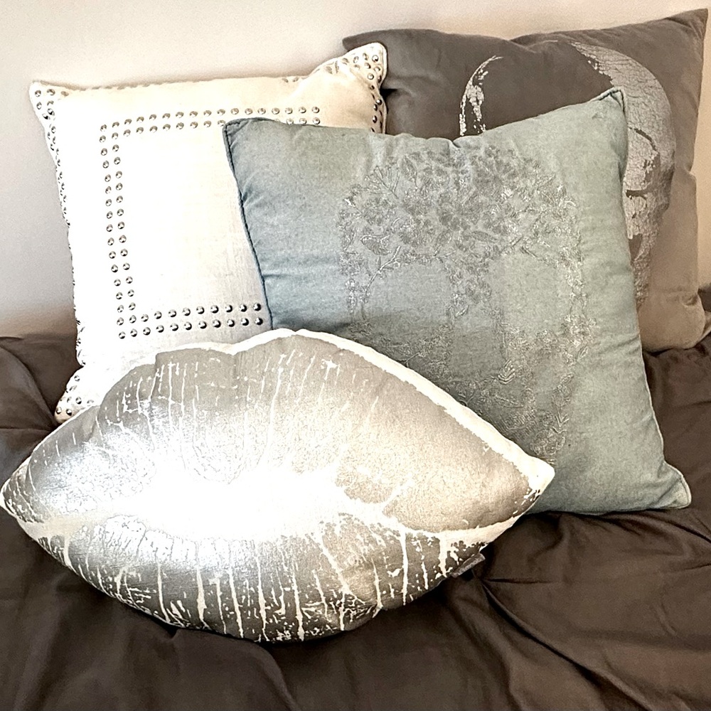 4 Dormify throw pillows in excellent condition. Primarily greys white and silver